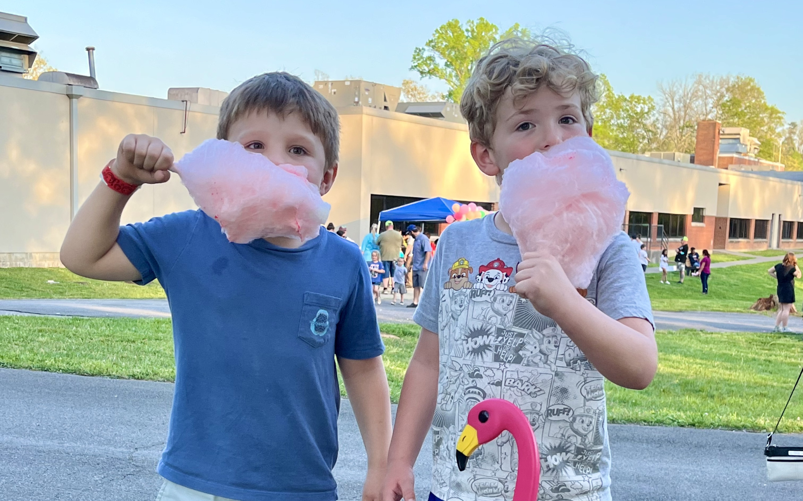Boys enjoying cotton candy at Spring Fling